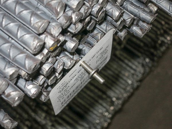 tags attached with steel welding studs to rebar ends