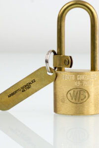 Brass Lock And Tag Engraved With Employee Name And Phone Number