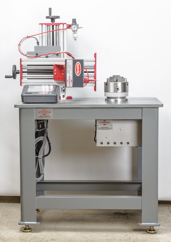 Heavy duty rotary dot peen marking system for pin marking on round parts.