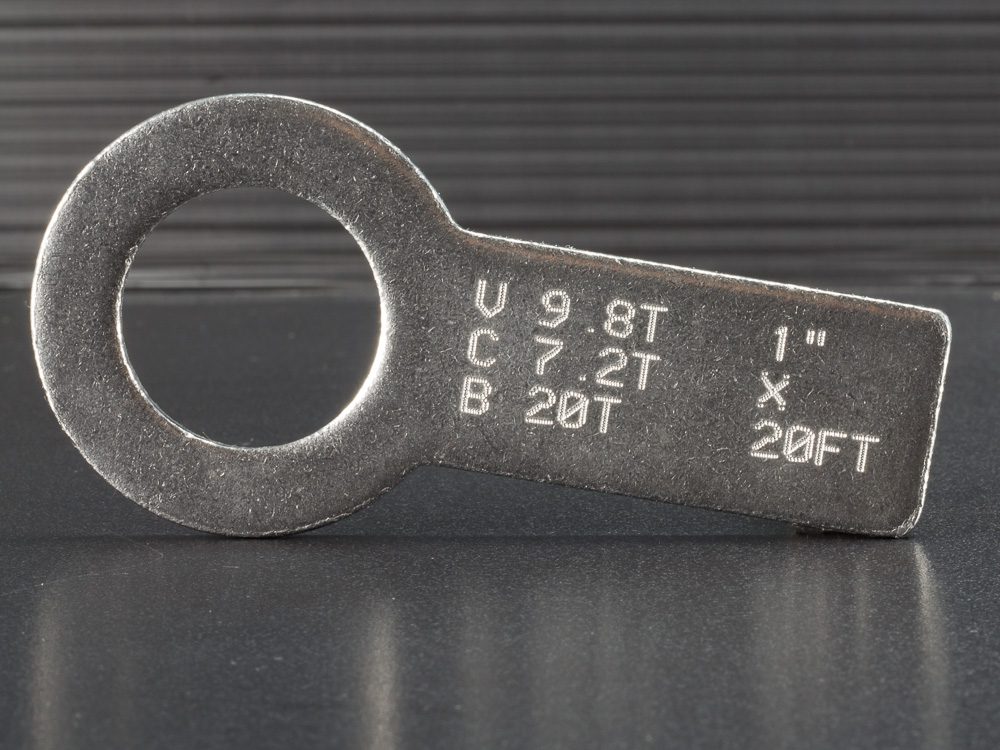 multiple lines of text stamped on a metal part