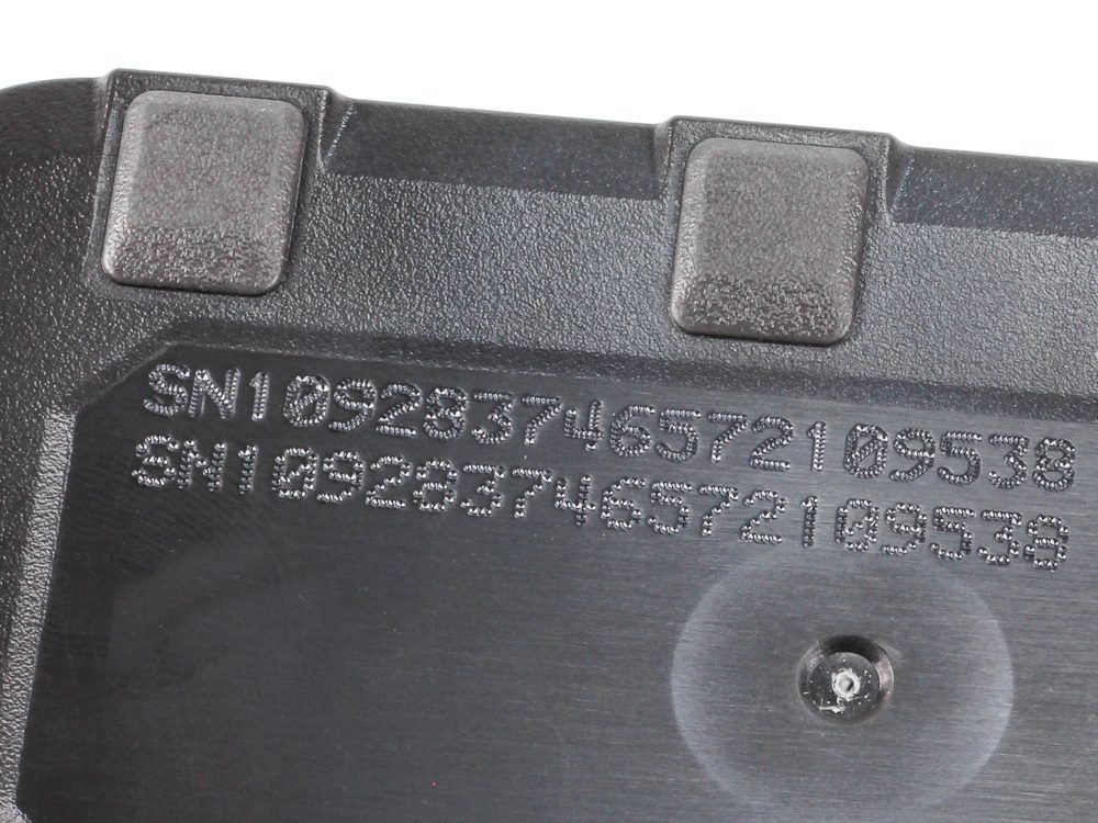 pin stamped serial number marks on a plastic EV battery case