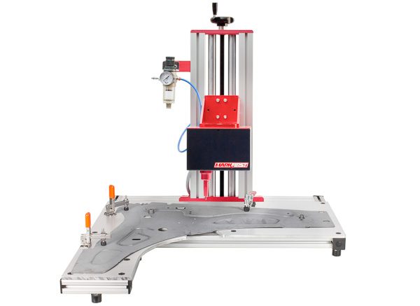 custom benchtop fixture for marking VIN numbers on vehicle panels