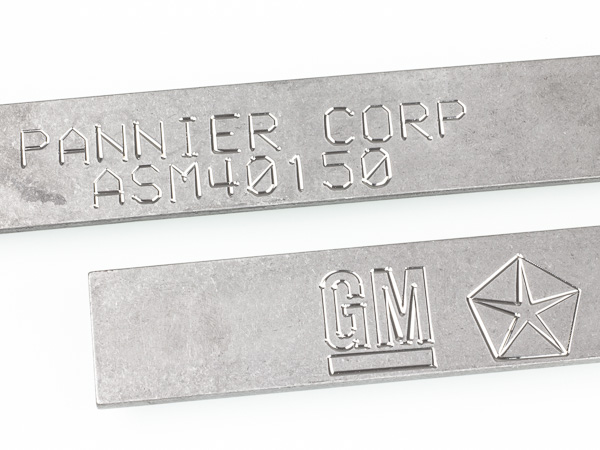 scribe marking text and logos on metal