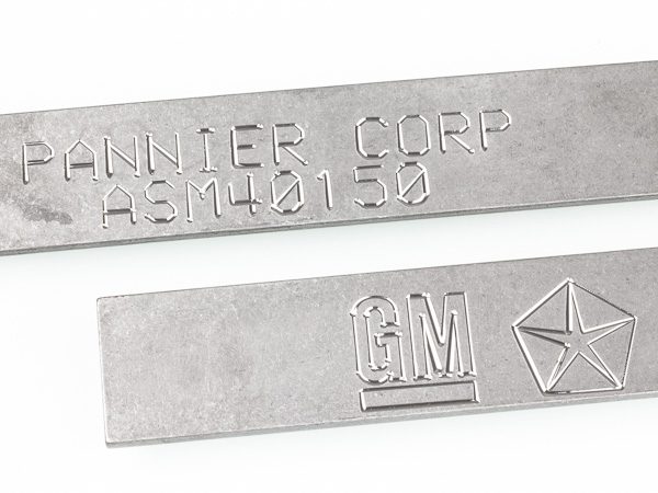 scribe marking text and logos on metal