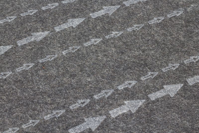 printing installation arrows on carpet backing