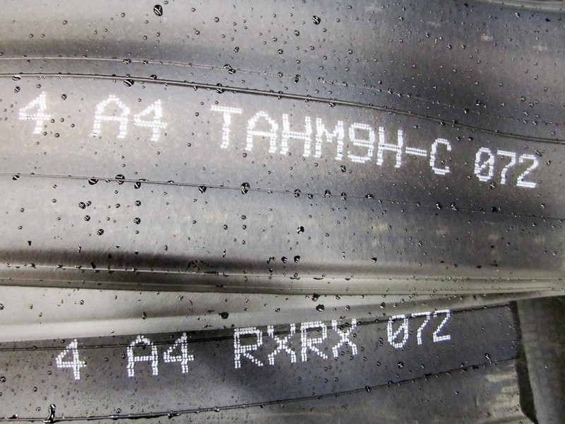 printed production codes on extruded rubber tread