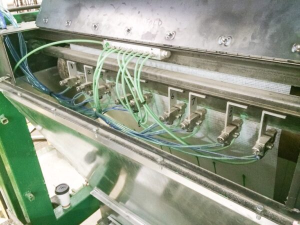 sistema automatizado de rayado con boquillas múltiples