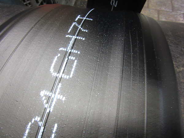 text and center line striping on tread