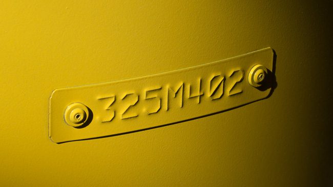 embossed metal tags for tracking parts through paint and powder coating processes