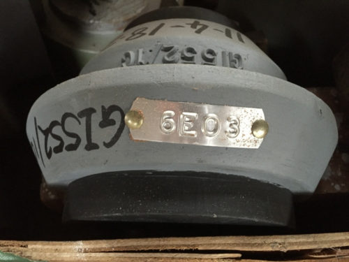 Metal Tag Riveted To Foundry Mold