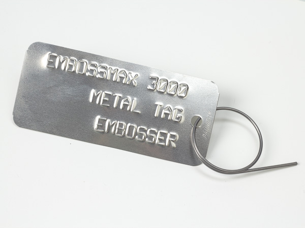 embossed tag with attachment clip