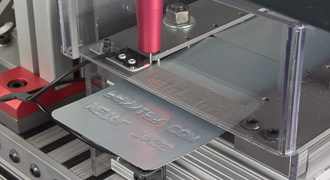 Automatic Tag Embossing System